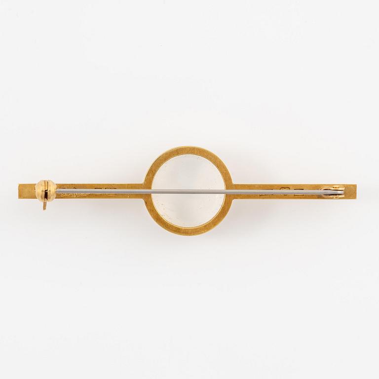 Wiwen Nilsson, a brooch, 18K gold with a cabochon-cut moonstone, Lund 1967.