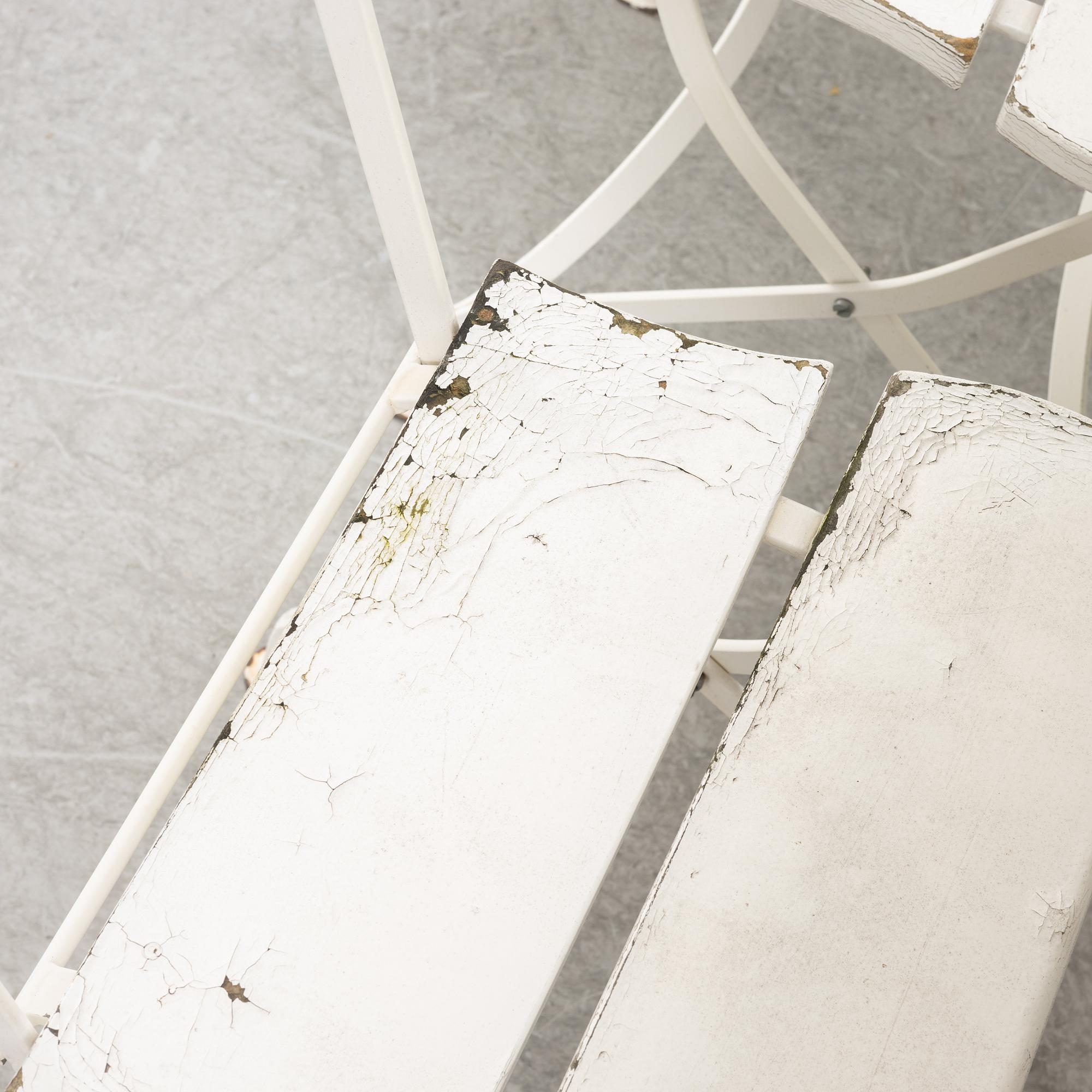 A set of seven garden chairs and two tables Byarums bruk, later part of the 20th century.