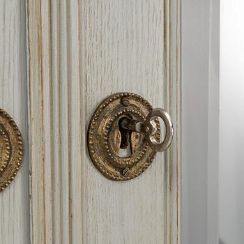 A cabinet, early 20th Century.