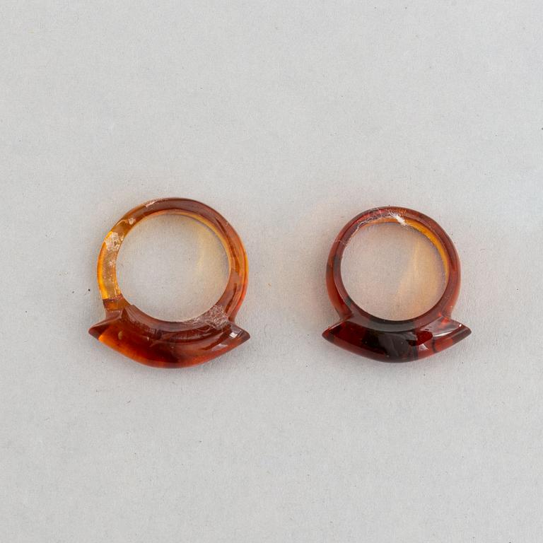 A group of amber objects, China, 20th Century. (14 small pieces).