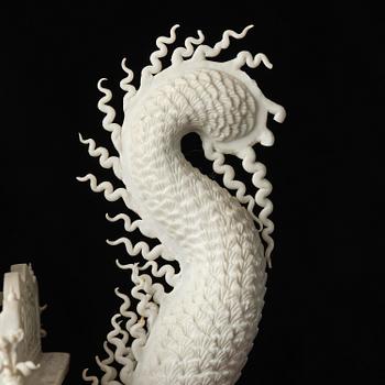 A white biscuit Dragon Boat, Qing dynasty, 19th Century.