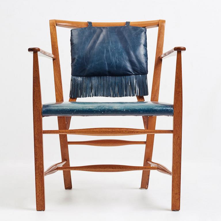 Josef Frank, a mahogany and blue leather chair for Firma Svenskt Tenn, Sweden probably 1950-60's.