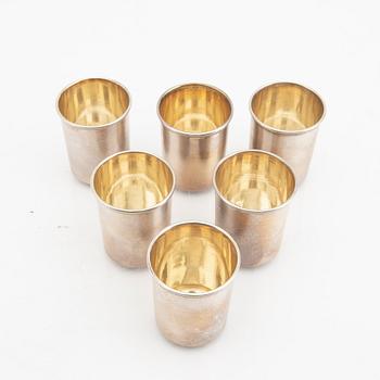 An eraly 20th century set of six silver cups mark of  Ivan Ekimovich Morozov St Petersburg weight 130 grams.