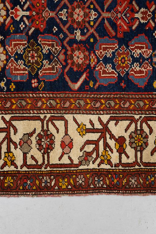 A rug, antique Kurdish, ca 247-253 x 116-125 cm.