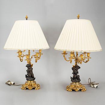 A pair of  mid 19th century, rococo-style TABLE LAMPS/CANDELABRA.