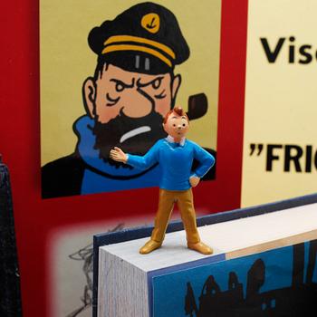 TIN TIN, parti, bl a affischer och figurer, 1900-talets andra hälft.