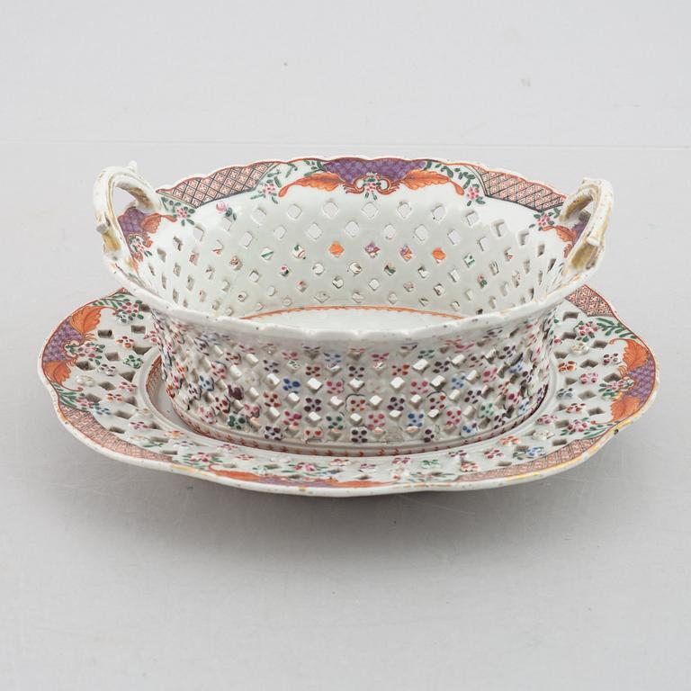 A famille rose chesnut basket with stand, Qing dynasty, 18th century.