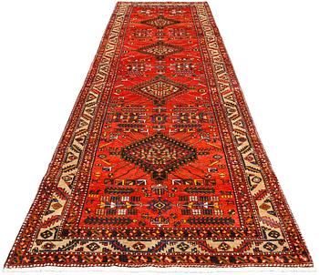 A Tabriz runner, c 430 x 115 cm.