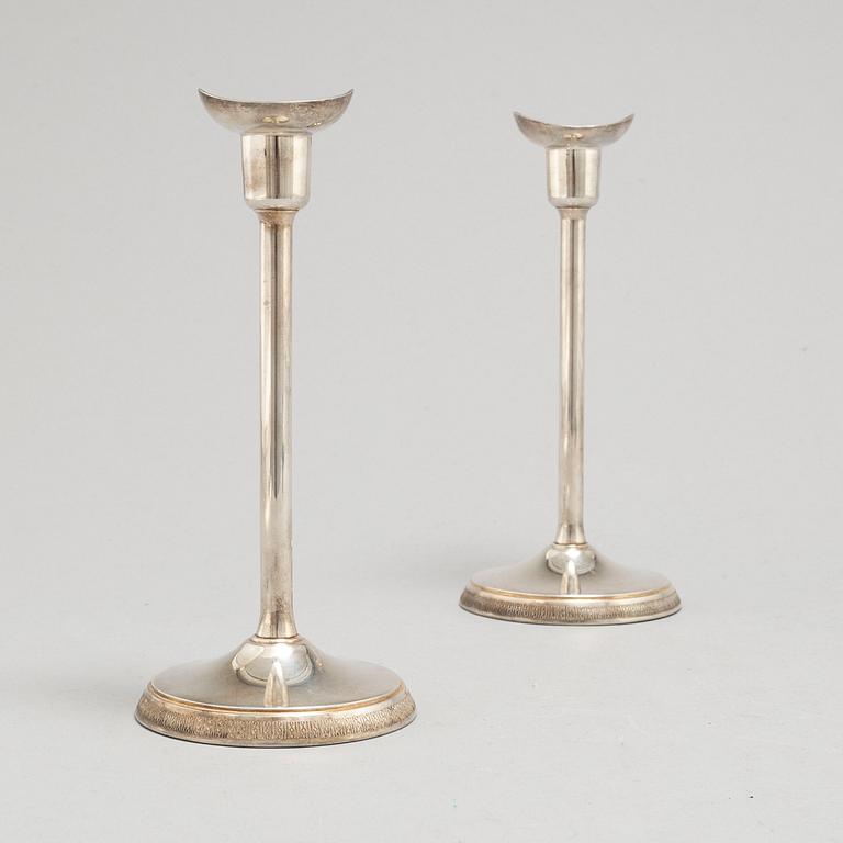 A pair of silver candle sticks by Ainar Axelsson, GAB, Stockholm, 1966.