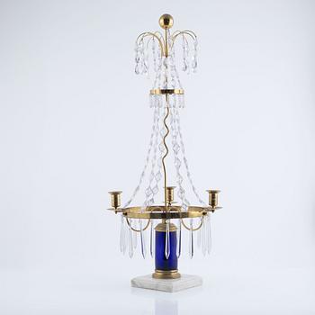 A three-light brass, marble, and glass lustre, 20th century incorporating older elements.