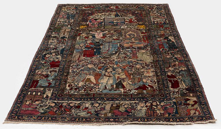 An antique Isfahan carpet, Central Persia, c. 260 x 138 cm.