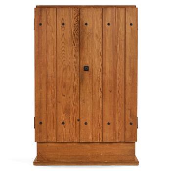 14. An Axel Einar Hjorth 'Lovö' stained pine cabinet, Nordiska Kompaniet, Sweden 1930's.
