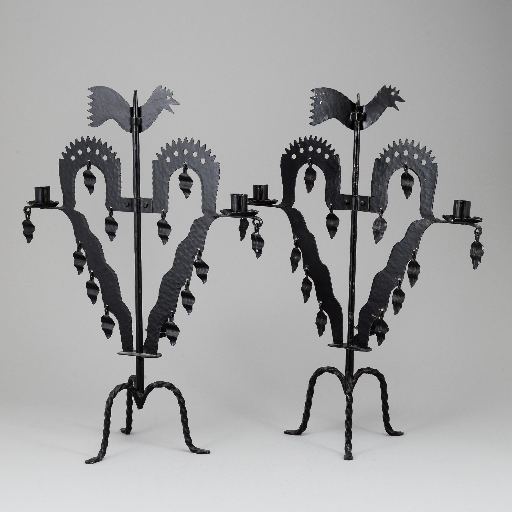 KANDELABRAR , 2 st smide, "Tuppljusstake" Design Gustaf Ancarkrona, Käck & Hedbys, Leksand.
