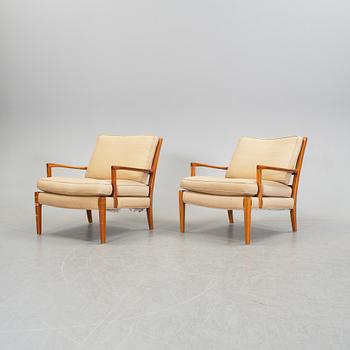 A pair of easy chairs by Arne Norell, late 20th century.