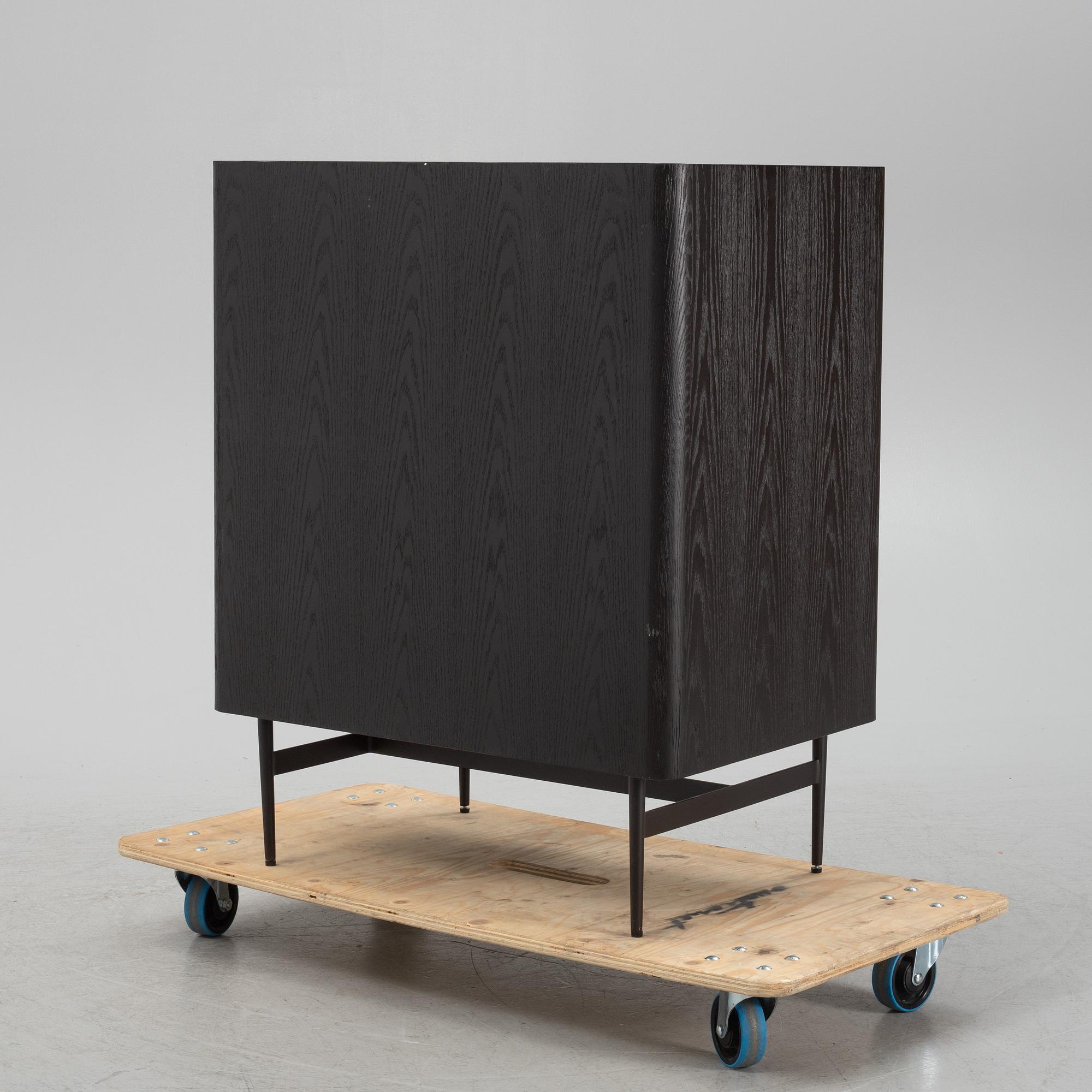 A black stained oak veneered 'Milano' dresser with top covering of faux stingray skin.