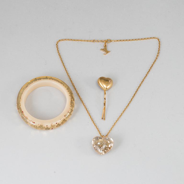 LOUIS VUITTON, a bangle, a necklace and a hairpin.