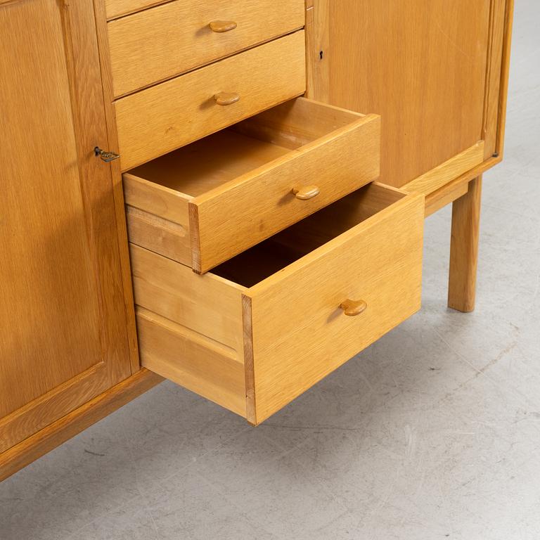 Sven Engström och Gunnar Myrstrand, an oak veneered sideboard, for Bodafors, dated 1962.