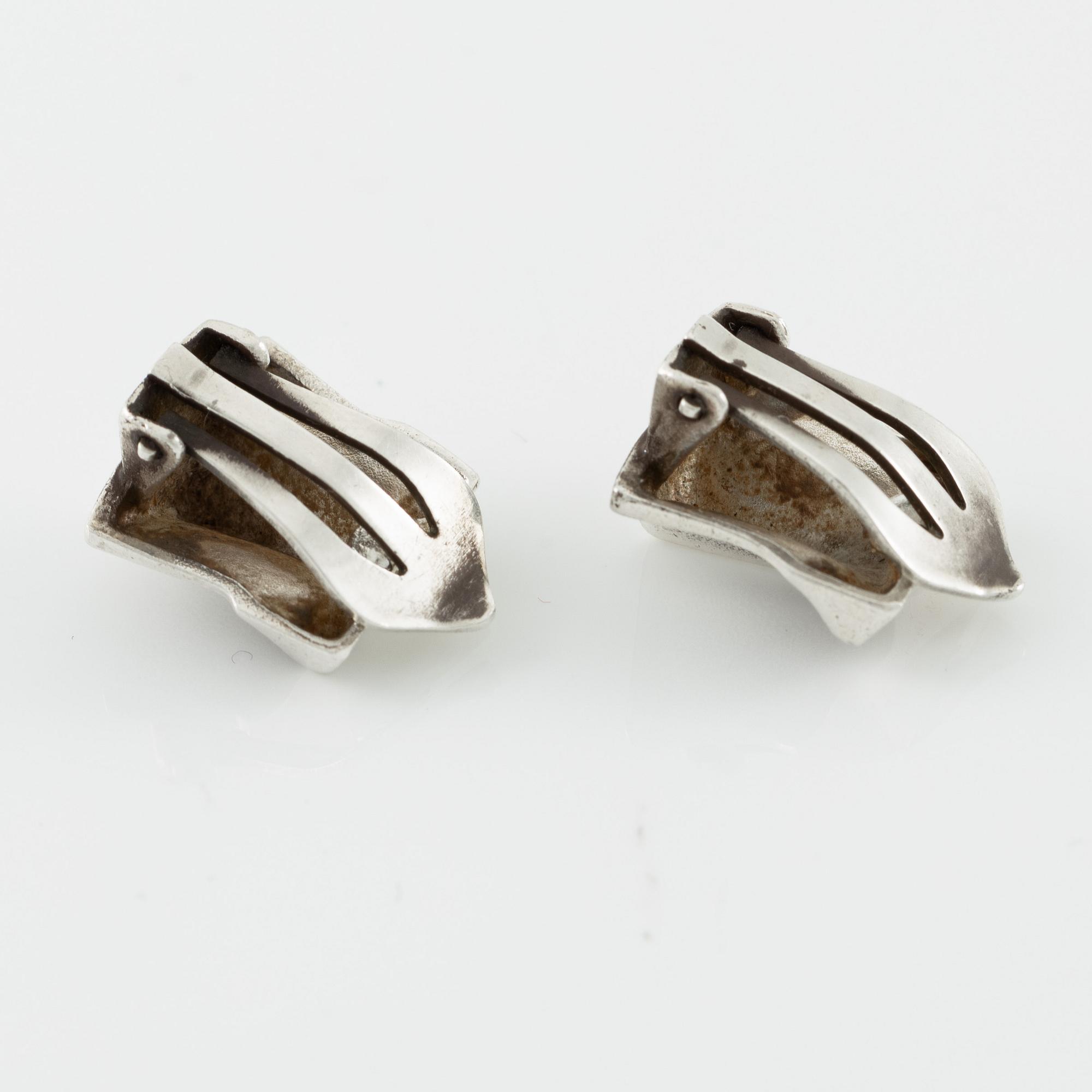 Lapponia a necklace, a pair of earrings and a brooch, sterling silver.