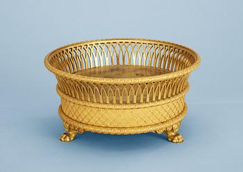 1272. An Empire early 19th century gilt bronze coaster.