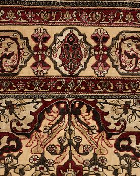 A RUG, a semi-antique silk Kashan relief (souf), ca 202 x 130,5-133 cm.