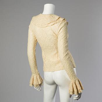 A wool/alpaca jacket by Ralph Lauren and two blouses.