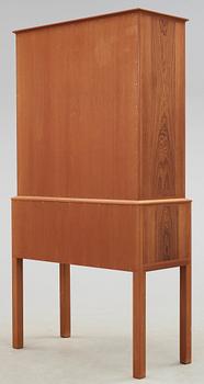 Carl Malmsten, A Carl Malmsten walnut and mahogany cabinet with floral inlays, Sweden 1959.