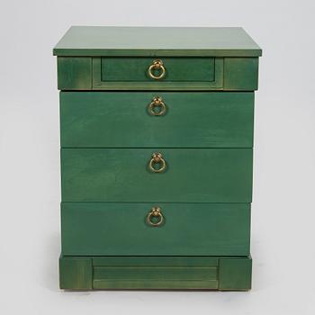 Desk/side table, a chair and a chest of drawers, last quarter of the 20th century.