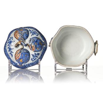 A Chinese blue and white 'pomegranate' tureen with cover and stand, Qing dynasty, Qianlong (1736-95).