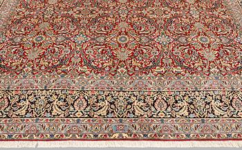 A Kirman lavar carpet, 403 x 304 cm.