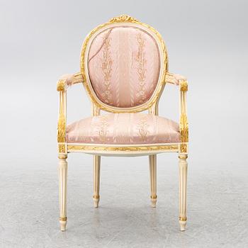 Dining table and armchair, Louis XVI style. Italy, second half of the 20th century.
