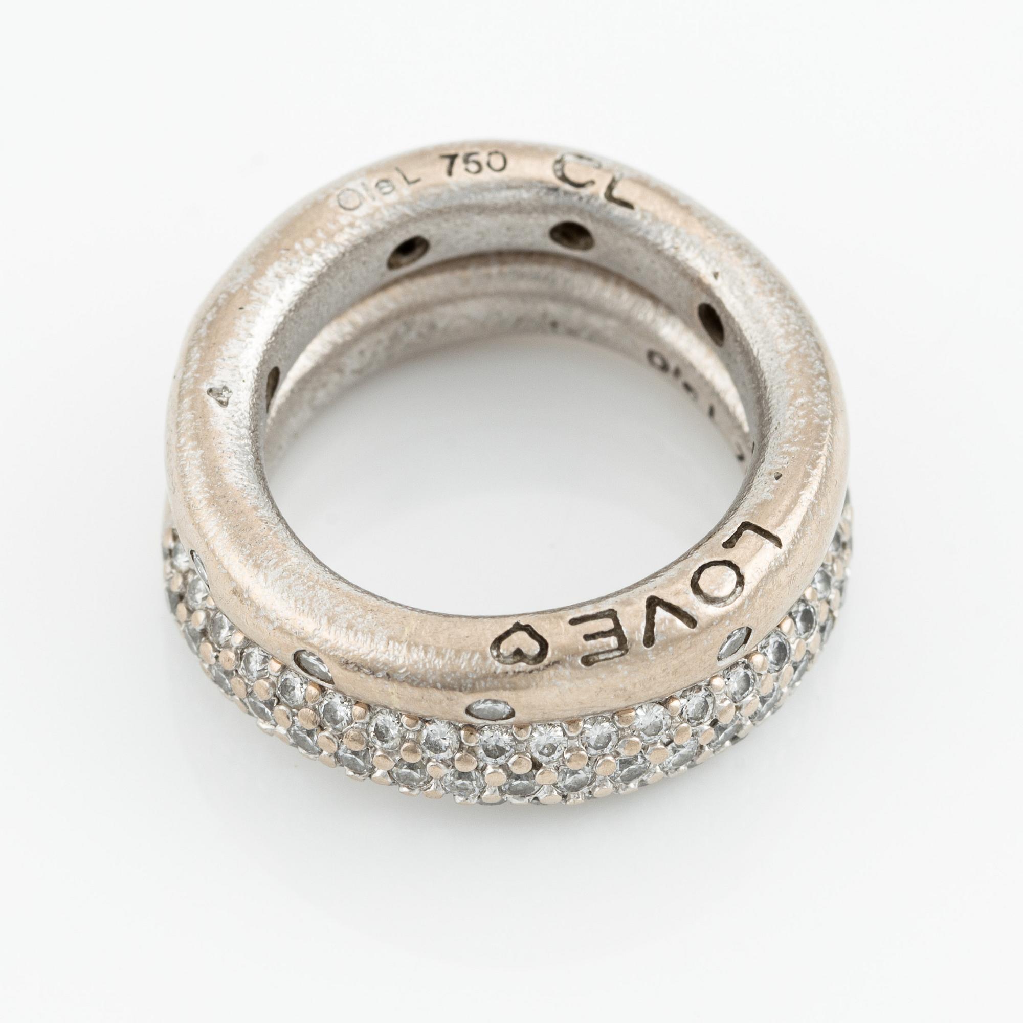 Ole Lynggaard two "Love" rings no. 4 in 18K white gold with round brilliant-cut diamonds.