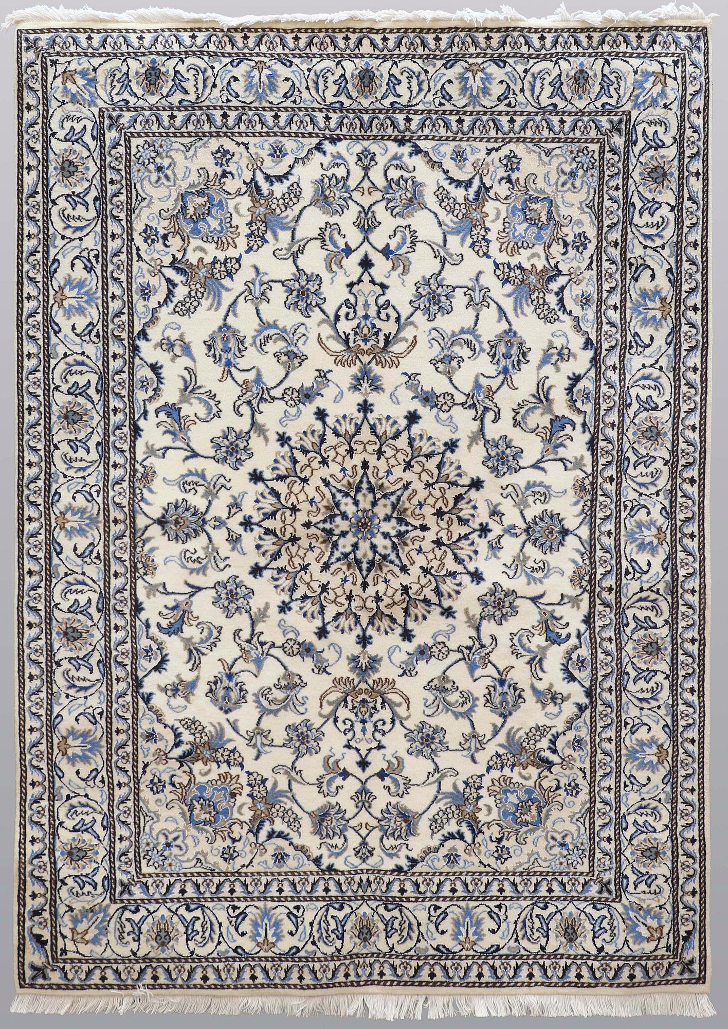A rug, Nain part silk, ca 235 x 160 cm.