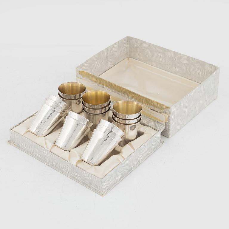 A set of 16 silver cups, including GAB, Stockholm 1964.