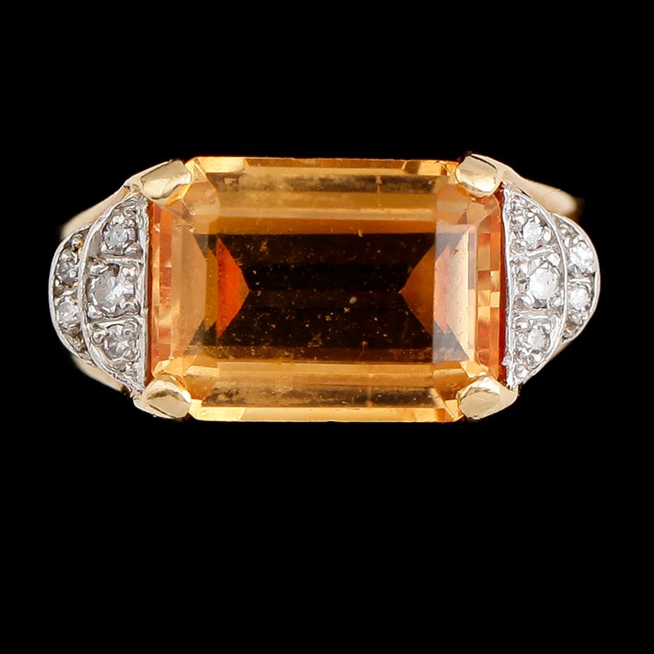 RING, 18 k guld med citrin och briljantslipade diamanter. Vikt ca 7 g.