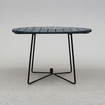 A mid 20th Century garden table from Grythyttan.