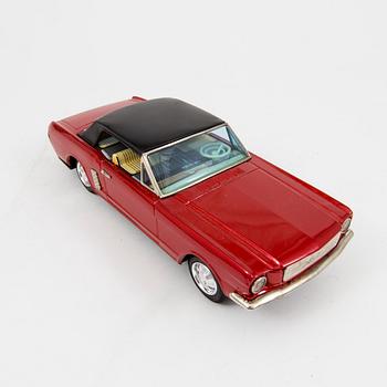 A Bandai tinplate "Ford Mustang with slip action", Japan, 1960s.