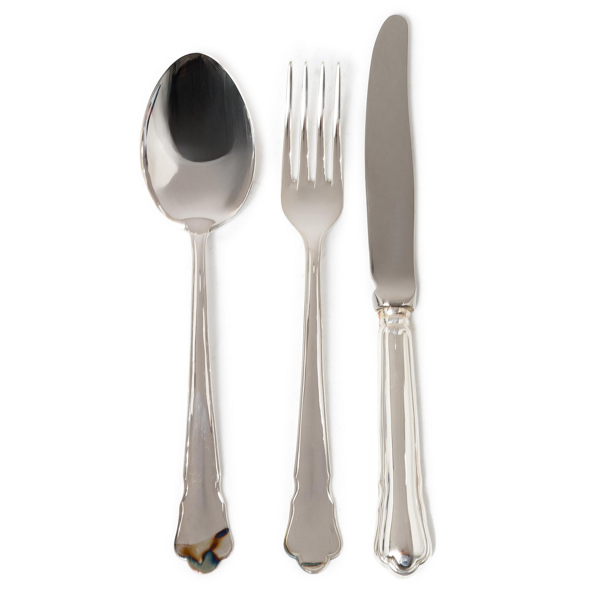 A 36-piece silver cutlery service, model Chippendale, EJA, 20207.