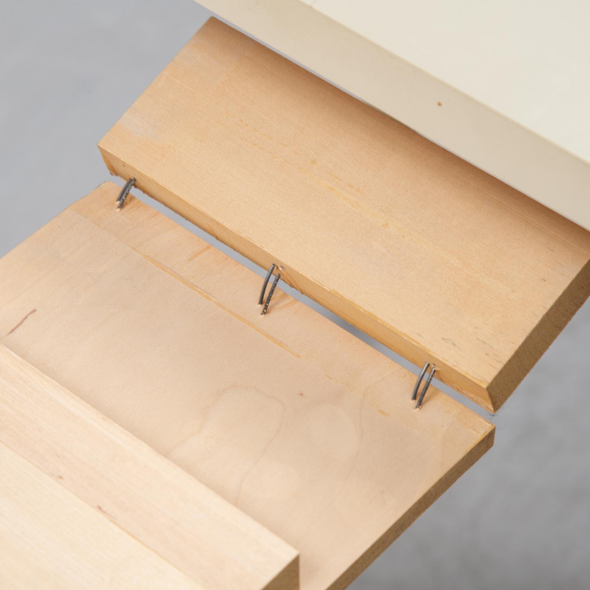 A dining table with two armchairs and six chairs by Carl Malmsten for Bodafors.