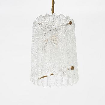Carl Fagerlund, a pair of brass and glass wall lights and a ceiling light, Orrefors.