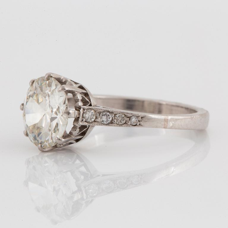 A platinum ring set with an old-cut diamond ca 2.25 cts quality ca K/L vs.