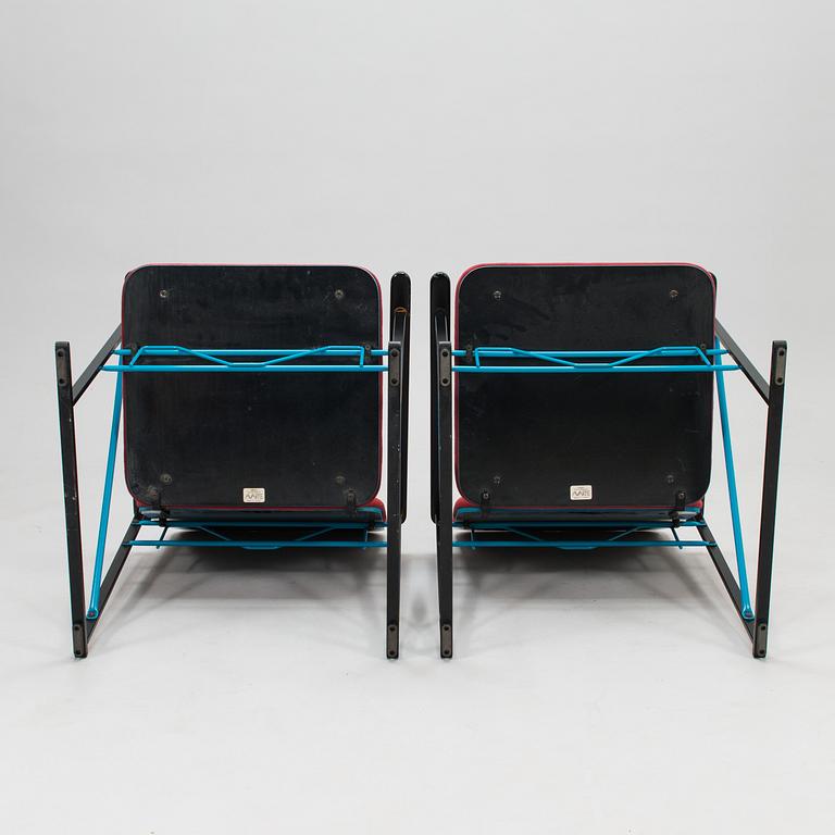 A pair of 1980s A500-series Armchairs and an ottoman by Yrjö Kukkapuro, Avarte, Finland.