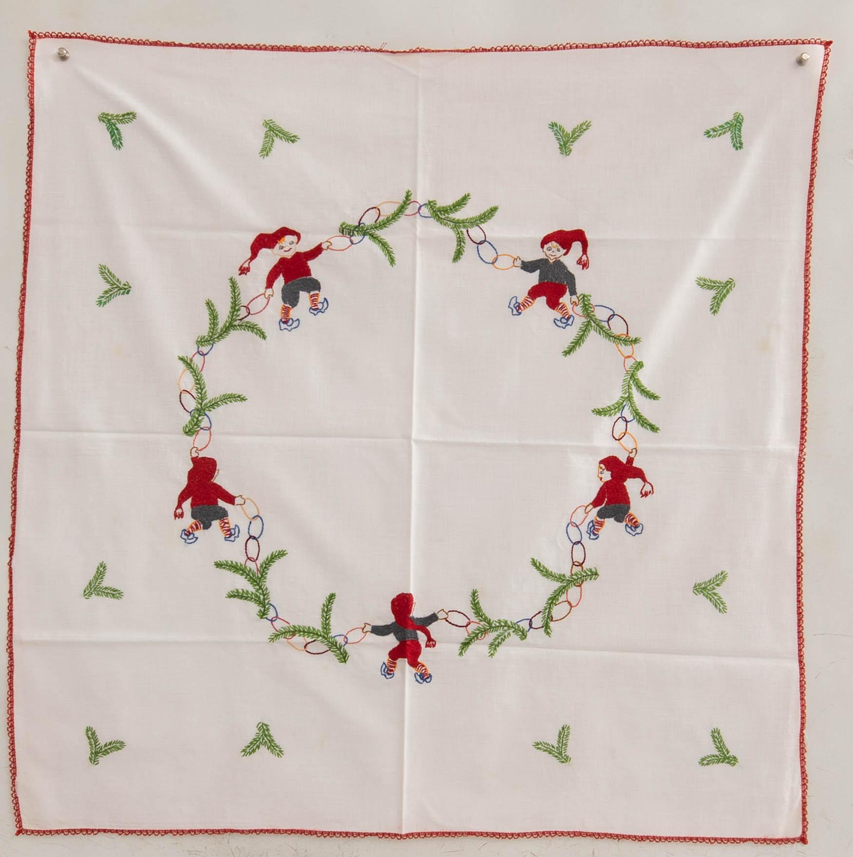 A collection of Christmas tablecloths 12 pcs first half/mid 20th century.