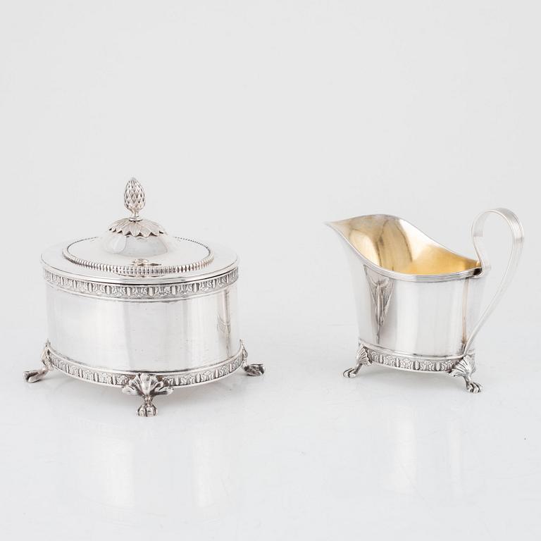 A Swedish silver sugar box and creamer, marks of Jacob Engelberth Torsk, Stockholm 1902.