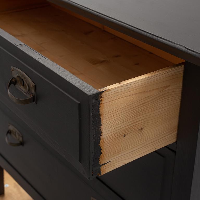 A painted chest of drawers circa 1900.