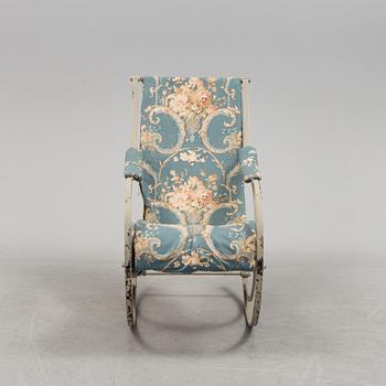 An iron rocking chair, 19th century.