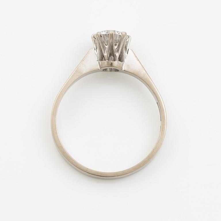 Ring in 18K white gold set with a brilliant-cut diamond weighing 0.84 ct according to the engraving.