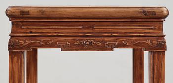 A blond hardwood table, late Qing dynasty (1644-1912).