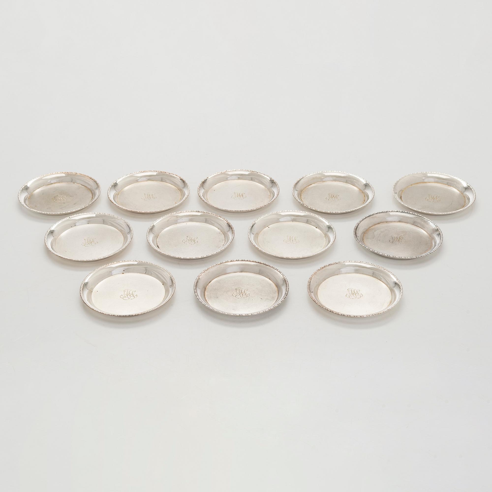 A 12-piece set of silver glass coasters, Kultakeskus, Hämeenlinna 1952. In original fitted case.