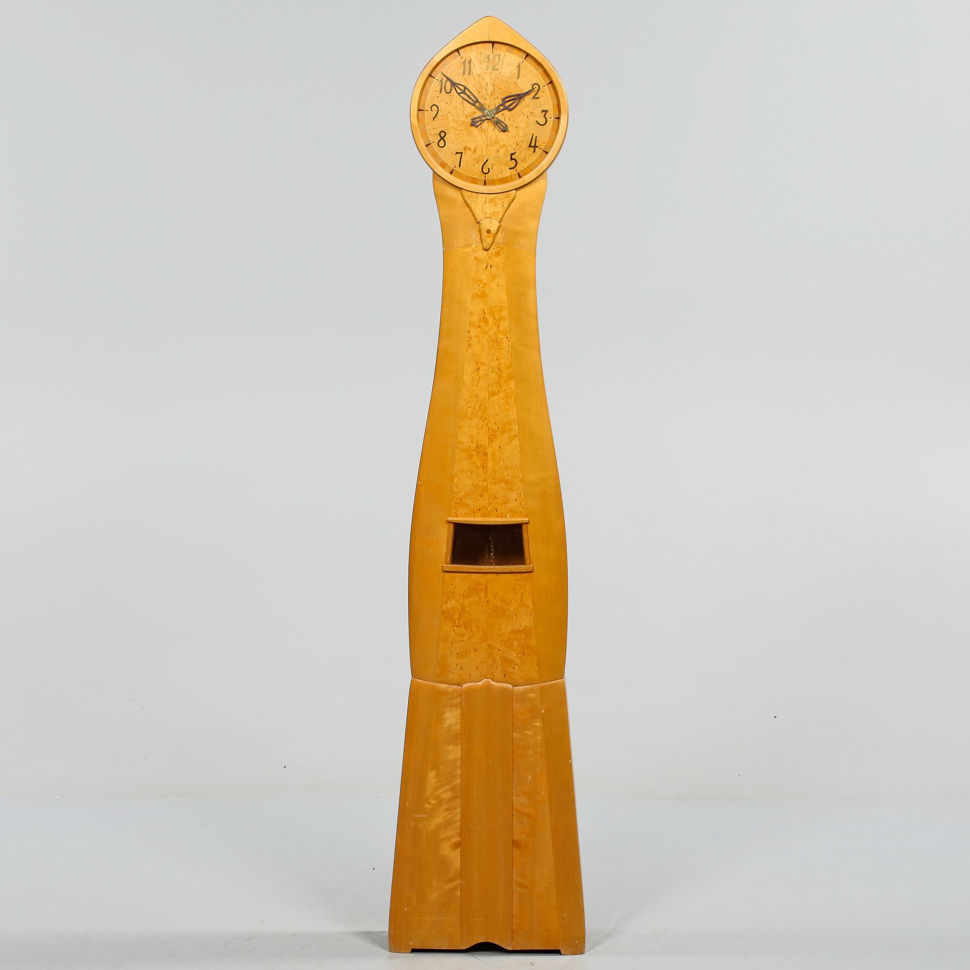 GOLVUR, Carl Malmsten, "Tidlösa", modellen formgiven år 1964.