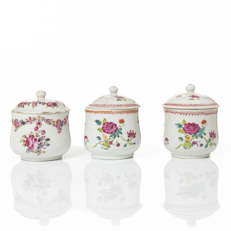 A group of 12 CHinese famille rose porcelain custard cups with covers, Qing dynasty, 18th century.